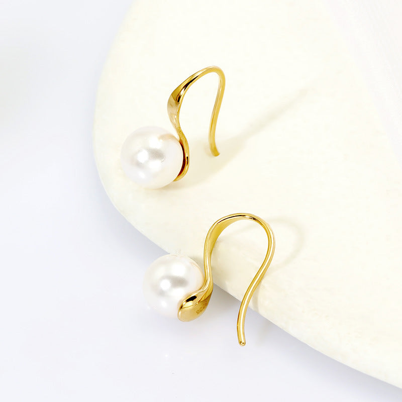 High heels and pearl earrings