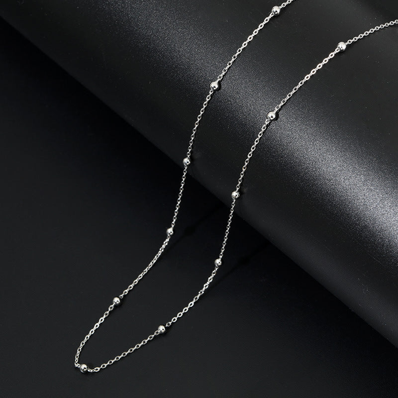 Class spacer bead chain snake bone necklace
