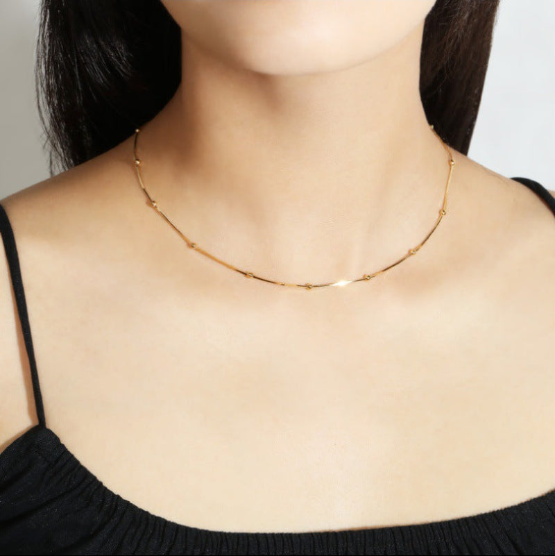 Class spacer bead chain snake bone necklace