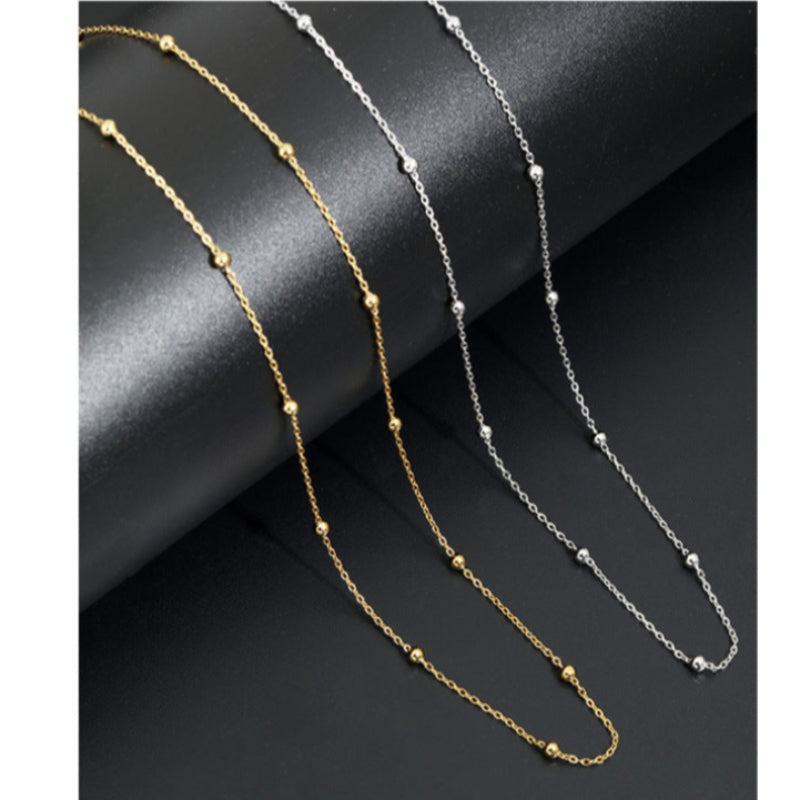 Class spacer bead chain snake bone necklace